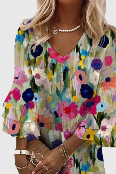 Katharina | Dames minijurk met bloemenprint, V-hals en ruchemouwen