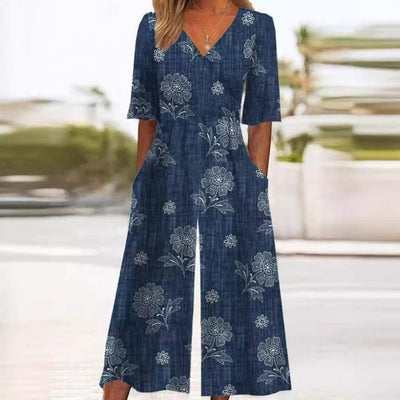 Annika | Dames boho jumpsuit met bloemenmotief, V-hals en halflange mouwen