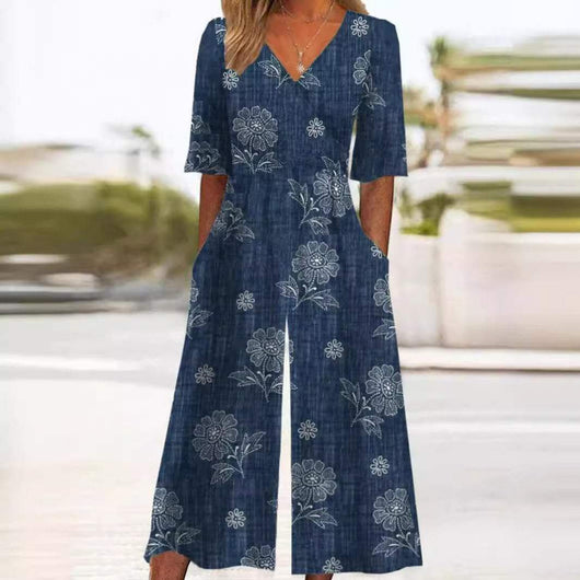 Annika | Dames boho jumpsuit met bloemenmotief, V-hals en halflange mouwen