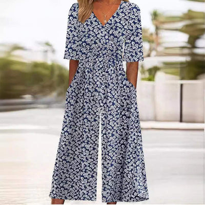 Annika | Dames boho jumpsuit met bloemenmotief, V-hals en halflange mouwen