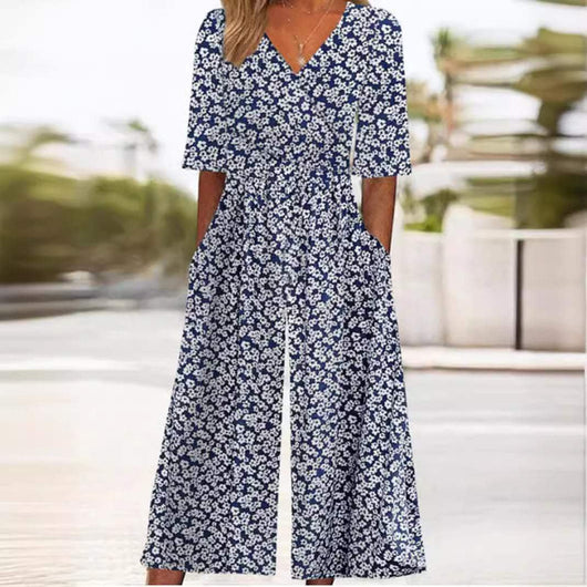 Annika | Dames boho jumpsuit met bloemenmotief, V-hals en halflange mouwen