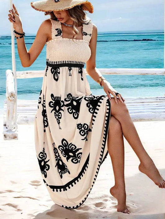 Lena | Mouwloze dames boho maxijurk met gesmokt bovenstuk en bloemenprint