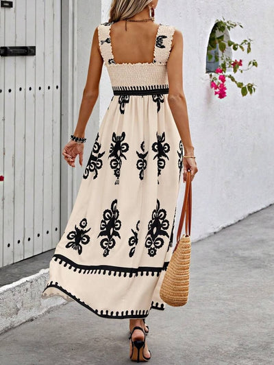 Lena | Mouwloze dames boho maxijurk met gesmokt bovenstuk en bloemenprint