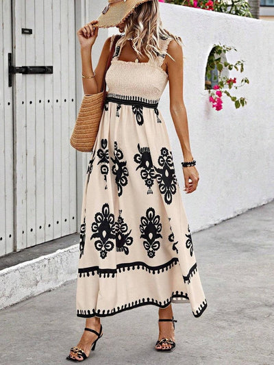 Lena | Mouwloze dames boho maxijurk met gesmokt bovenstuk en bloemenprint