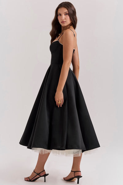 Annika | Dames cocktailjurk met zwierige midirok en verstelbare bandjes
