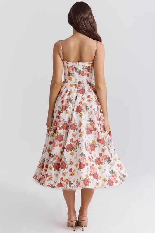 Annika | Dames cocktailjurk met zwierige midirok en verstelbare bandjes