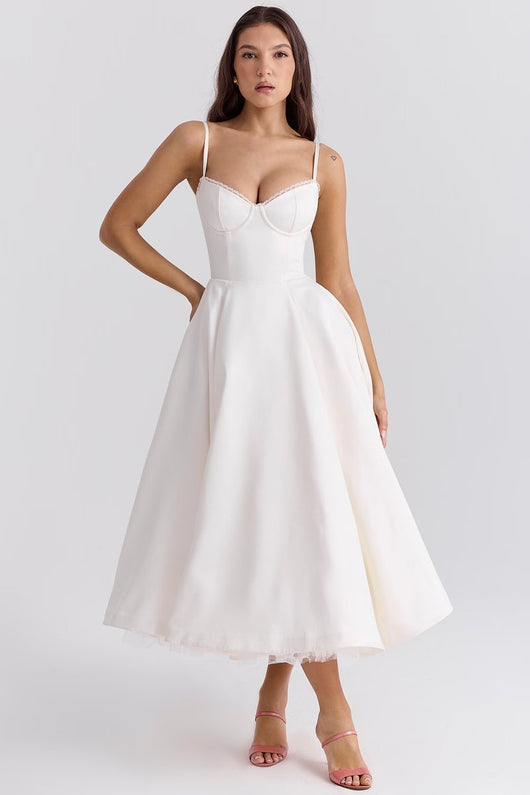 Annika | Dames cocktailjurk met zwierige midirok en verstelbare bandjes