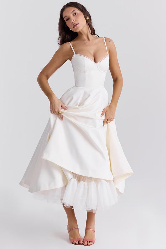 Annika | Dames cocktailjurk met zwierige midirok en verstelbare bandjes
