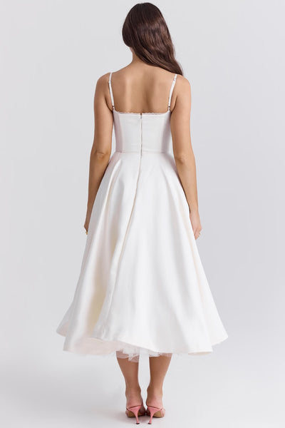 Annika | Dames cocktailjurk met zwierige midirok en verstelbare bandjes