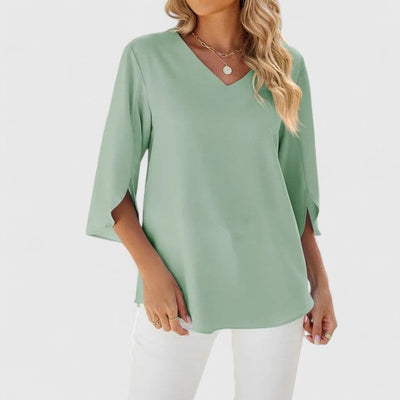 Marlene | Elegante dames ruchesblouse met V-hals en driekwartmouwen