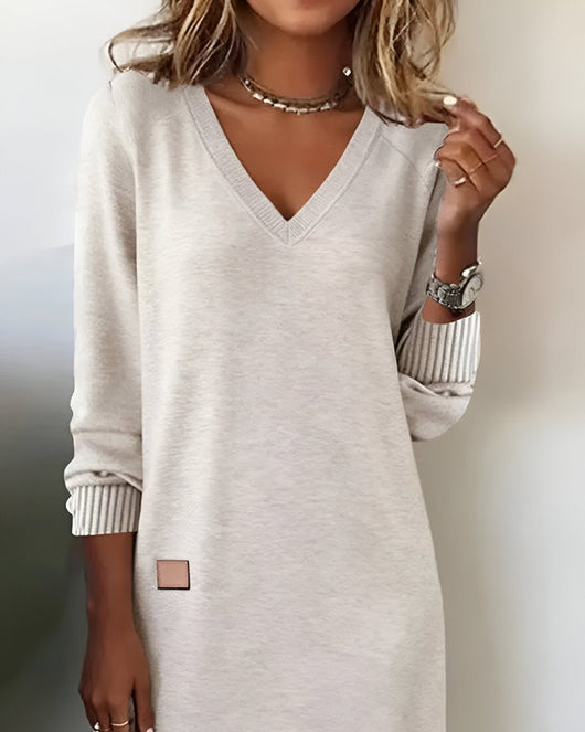 Mia | Elegante dames midijurk met V-hals en lange mouwen