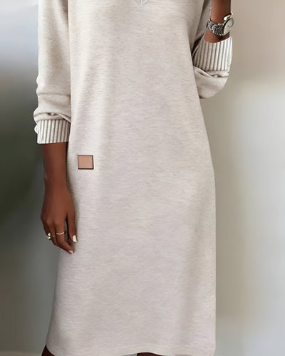 Mia | Elegante dames midijurk met V-hals en lange mouwen