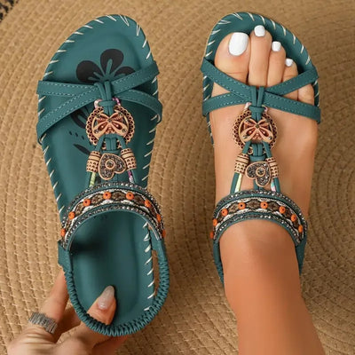 Amelie | Platte dames bohosandalen met bandjes, parels en comfortvoetbed