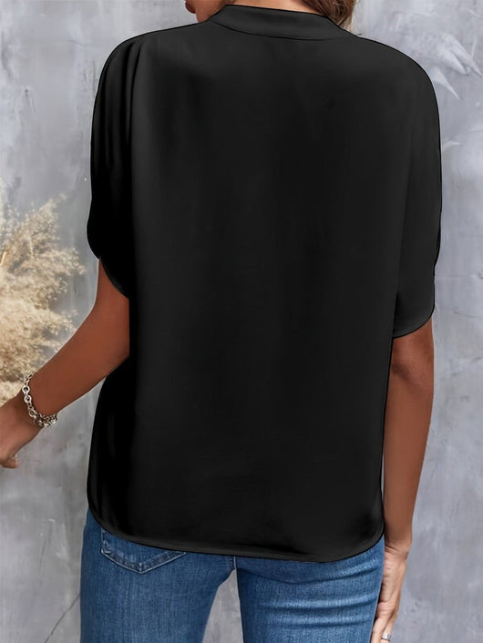 Lena | Vloeiende dames blouse met v-hals en wijde mouwen