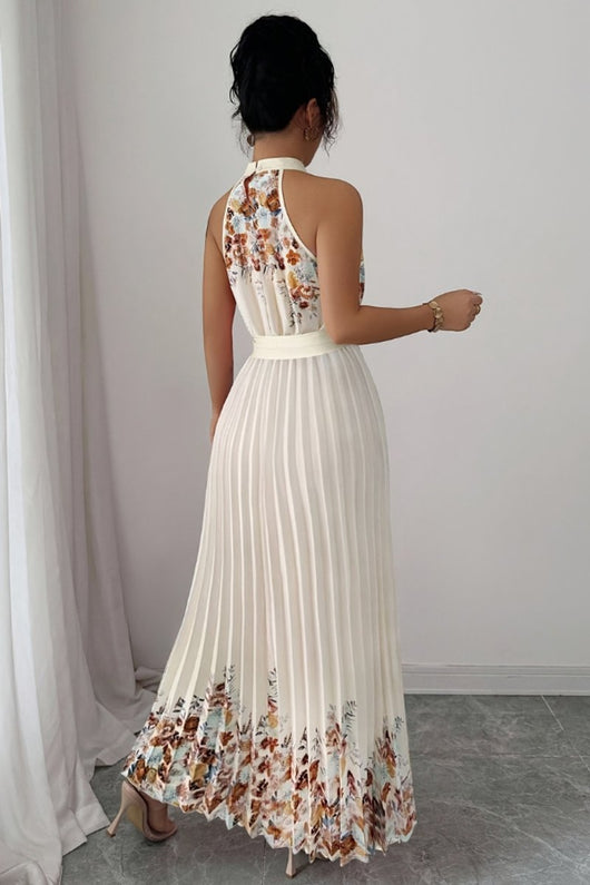 Emilia | Dames midijurk met plissérok, halterhals en bloemendessin