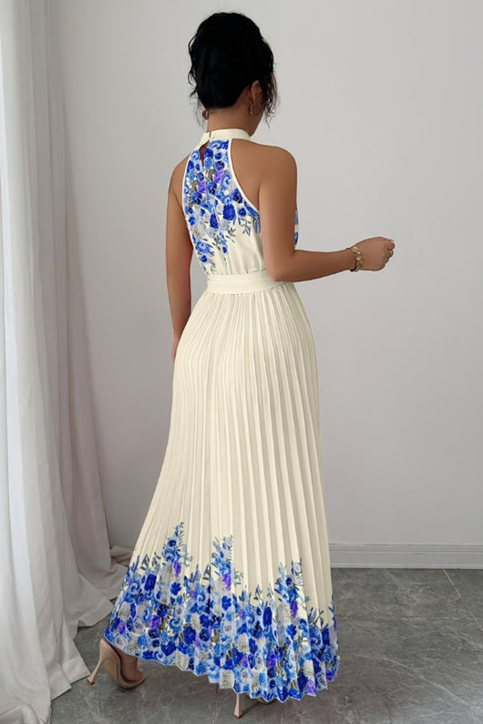 Emilia | Dames midijurk met plissérok, halterhals en bloemendessin