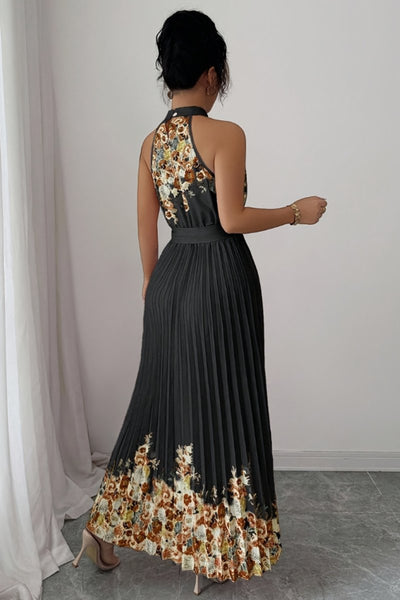 Emilia | Dames midijurk met plissérok, halterhals en bloemendessin