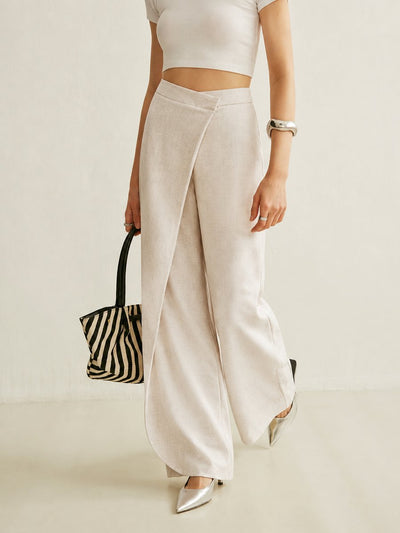 Johanna | Dames high waist broek met wijde pijpen en asymmetrisch wikkelfront