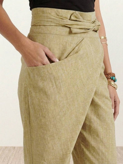 Nora | Dames cropped wikkelbroek met hoge taille, taps toelopende pijp en strikband