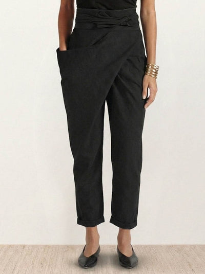 Nora | Dames cropped wikkelbroek met hoge taille, taps toelopende pijp en strikband