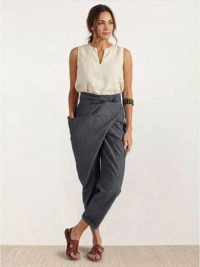 Nora | Dames cropped wikkelbroek met hoge taille, taps toelopende pijp en strikband
