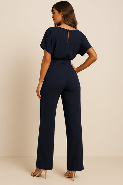 Greta | Mouwloze dames jumpsuit met strikband en wijde pijpen