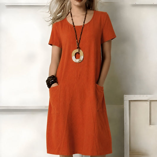 Greta | Losvallende dames boho midijurk met korte mouwen en zakken