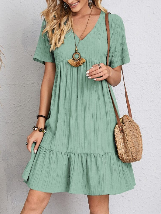 Charlotte | Dames babydoll zomerjurk met korte mouwen, V-hals en gesmokte taille