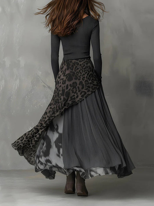 Amelie | Dames maxijurk met lange mouwen, luipaardprint en asymmetrische zoom