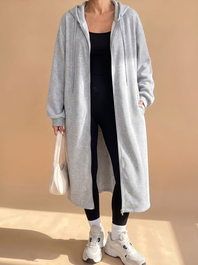 Frieda | Lange dames jas met capuchon, rits en relaxed fit
