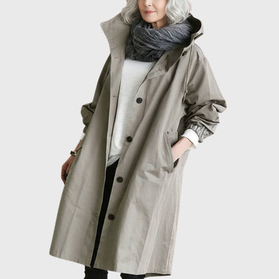 Clara | Lange waterafstotende dames trenchcoat met capuchon en wijde pasvorm