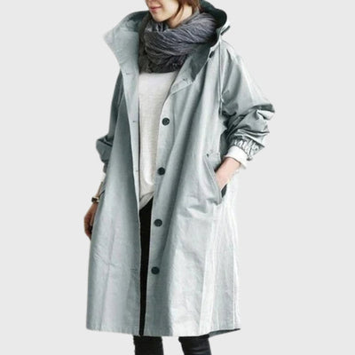 Clara | Lange waterafstotende dames trenchcoat met capuchon en wijde pasvorm