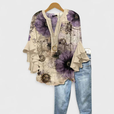 Clara | Lichte dames blouse met bloemenprint, V-hals en ruchemouwen