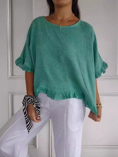 Annika | Linnen dames blouse met ronde hals, franjerand en losse pasvorm