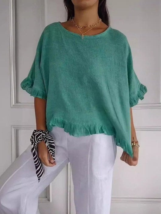 Annika | Linnen dames blouse met ronde hals, franjerand en losse pasvorm