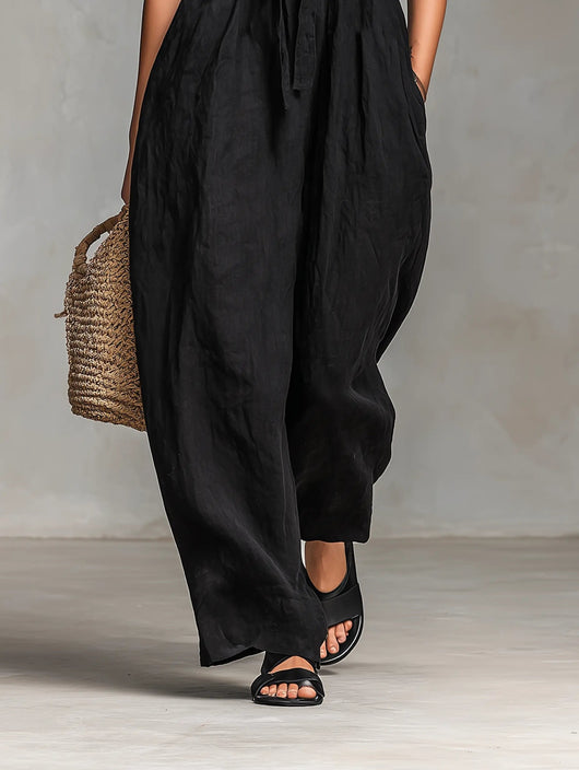 Hannah | Strapless dames linnen jumpsuit met wijde pijpen en strikband