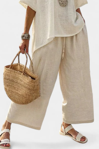 Lena | Dames linnen tweedelige set met asymmetrische top en wijde broek