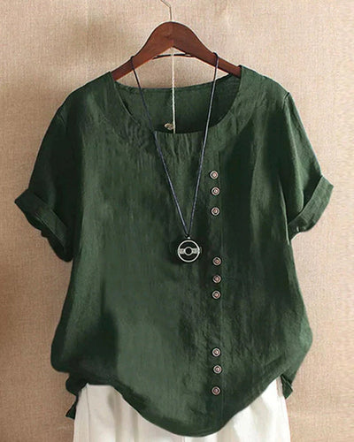 Sophie | Losvallende linnen damesblouse met korte mouwen en asymmetrische knoopsluiting