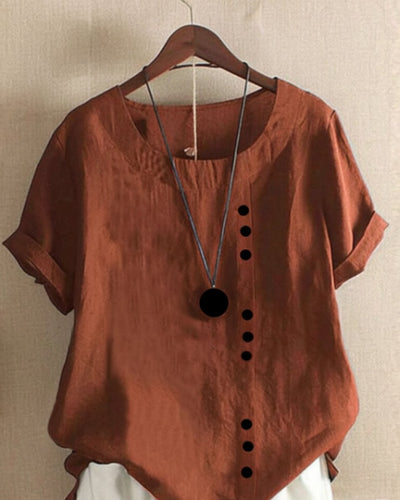 Sophie | Losvallende linnen damesblouse met korte mouwen en asymmetrische knoopsluiting