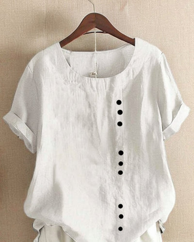 Sophie | Losvallende linnen damesblouse met korte mouwen en asymmetrische knoopsluiting