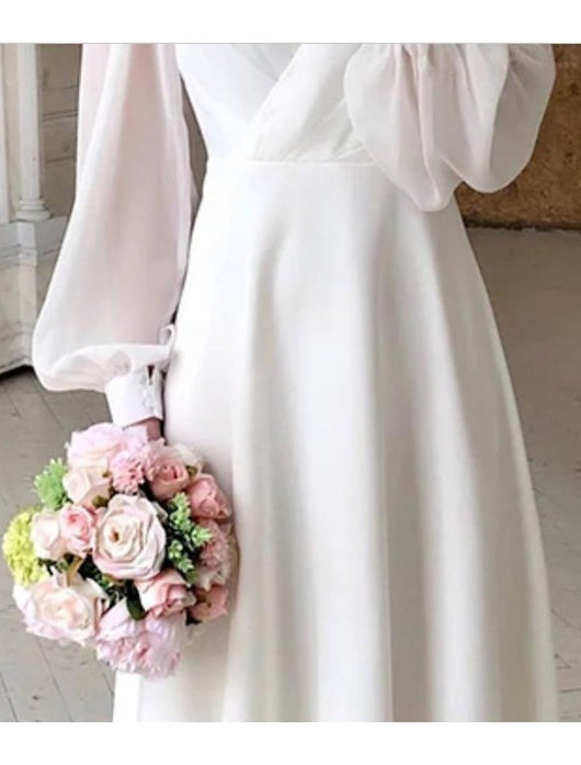 Greta | Elegante dames midijurk met V-hals en pofmouwen
