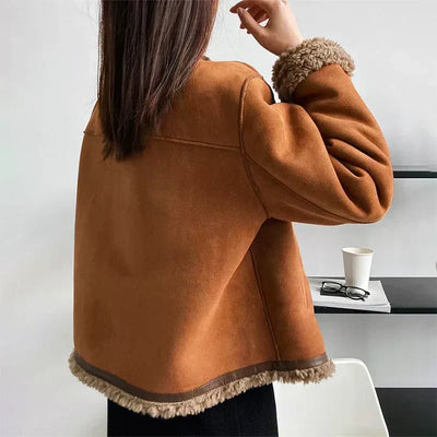 Luisa | Dames oversized jas van imitatieschapenvacht met knoopsluiting en sherpavoering