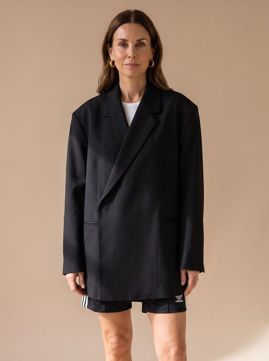 Elfriede | Oversized lange dames blazer met reverskraag en knoopdetails