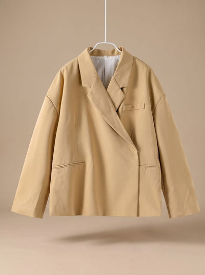 Elfriede | Oversized lange dames blazer met reverskraag en knoopdetails