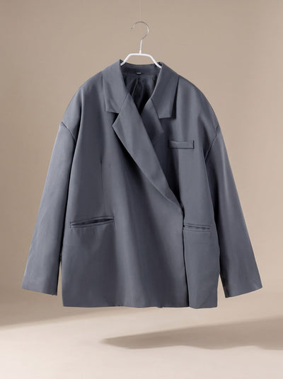 Elfriede | Oversized lange dames blazer met reverskraag en knoopdetails