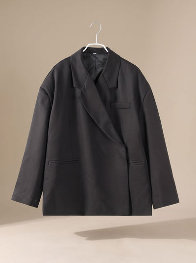 Elfriede | Oversized lange dames blazer met reverskraag en knoopdetails