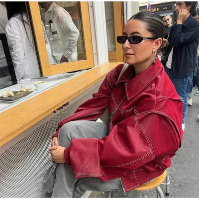 Elisabeth | Oversized dames bomberjack in imitatieleer met contrastnaden