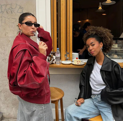 Elisabeth | Oversized dames bomberjack in imitatieleer met contrastnaden