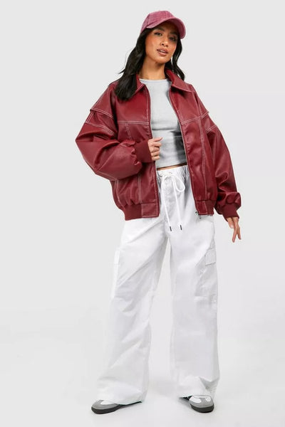 Elisabeth | Oversized dames bomberjack in imitatieleer met contrastnaden