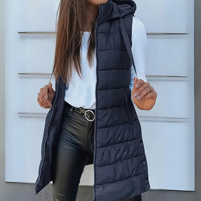 Frieda | Lange mouwloze dames bodywarmer met capuchon